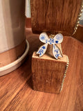 white + blue floral bows